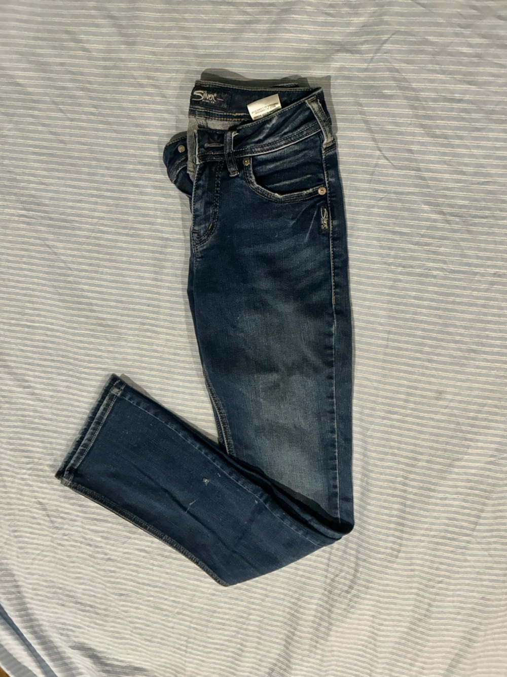 Distressed Silver Jeans dark blue denim low-rise jeans